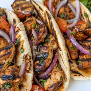 Easy Mediterranean Chicken Gyros taken with iphone 15 pro max --iw 2 --ar 4:5 --v 6.0 --raw