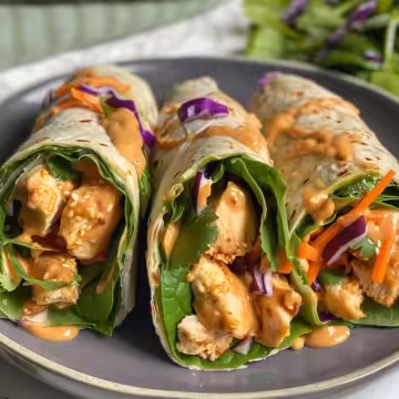 Easy Thai Peanut Chicken Wraps taken with iphone 15 pro max --iw 2 --ar 4:5 --v 6.0 --raw