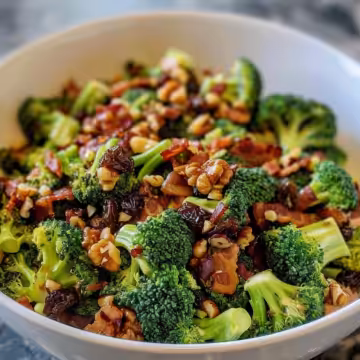 Flavorful Broccoli Raisin Salad with Bacon taken with iphone 15 pro max --iw 2 --ar 4:5 --v 6.0 --raw