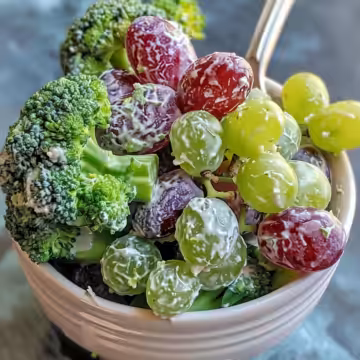 Fresh Broccoli Grape Salad taken with iphone 15 pro max --iw 2 --ar 4:5 --v 6.0 --raw