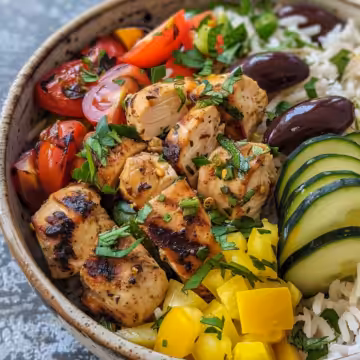 Fresh Mediterranean Chicken Bowl with Rice taken with iphone 15 pro max --iw 2 --ar 4:5 --v 6.0 --raw