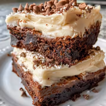 Frosted Baileys Brownies taken with iphone 15 pro max --iw 2 --ar 4:5 --v 6.0 --raw