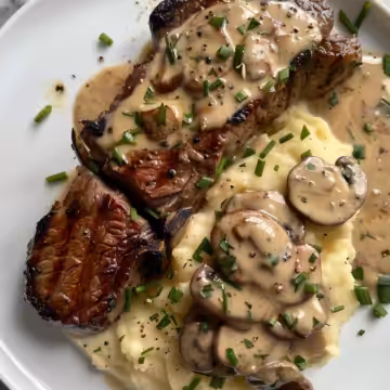 Gaelic Irish Steaks with Whiskey Cream taken with iphone 15 pro max --iw 2 --ar 4:5 --v 6.0 --raw