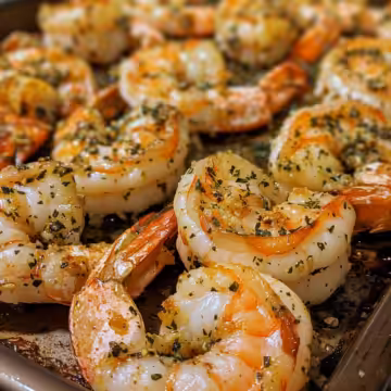 Garlic Parmesan Roasted Shrimp taken with iphone 15 pro max --iw 2 --ar 4:5 --v 6.0 --raw