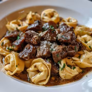 Garlic Steak Tortellini taken with iphone 15 pro max --iw 2 --ar 4:5 --v 6.0 --raw