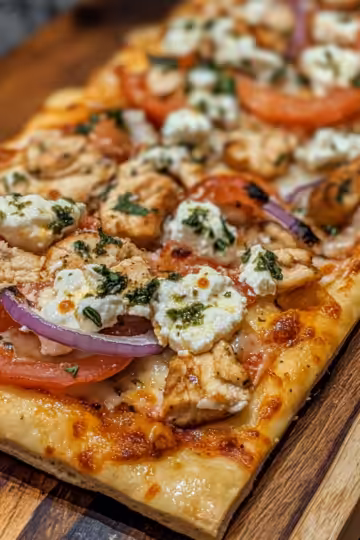 Greek Chicken Flatbread taken with iphone 15 pro max --iw 2 --ar 4:5 --v 6.1 --raw