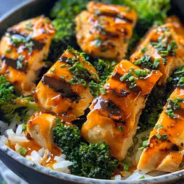 Healthy Grilled Chicken Broccoli Bowls with Garlic Sauce taken with iphone 15 pro max --iw 2 --ar 4:5 --v 6.0 --raw