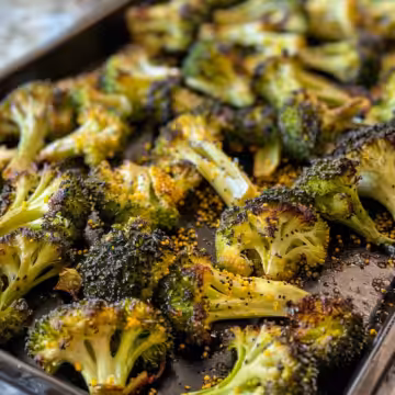 Honey Mustard Roasted Broccoli taken with iphone 15 pro max --iw 2 --ar 4:5 --v 6.0 --raw