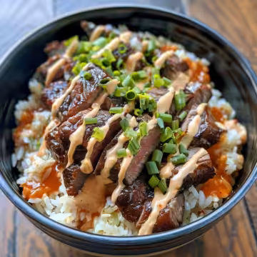 Korean BBQ Steak Rice Bowls with Spicy Cream Sauce taken with iphone 15 pro max --iw 2 --ar 4:5 --v 6.0 --raw