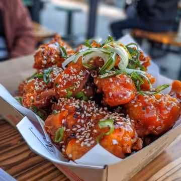 Korean Fried Chicken taken with iphone 15 pro max --iw 2 --ar 4:5 --v 6.0 --raw