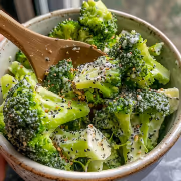 Marinated Broccoli Salad taken with iphone 15 pro max --iw 2 --ar 4:5 --v 6.0 --raw