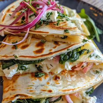 Mediterranean Quesadillas with Spinach, Feta, Mozzarella, and Red Onion taken with iphone 15 pro max --iw 2 --ar 4:5 --v 6.0 --raw
