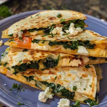 Mediterranean Quesadillas with Spinach & Feta taken with iphone 15 pro max --iw 2 --ar 4:5 --v 6.0 --raw