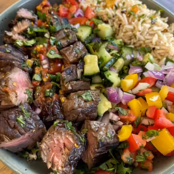 Mediterranean Steak Bowl taken with iphone 15 pro max --iw 2 --ar 4:5 --v 6.0 --raw
