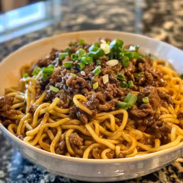Mongolian Ground Beef Noodles taken with iphone 15 pro max --iw 2 --ar 4:5 --v 6.0 --raw
