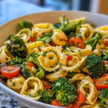 Mouthwatering Broccoli and Tortellini Salad taken with iphone 15 pro max --iw 2 --ar 4:5 --v 6.0 --raw