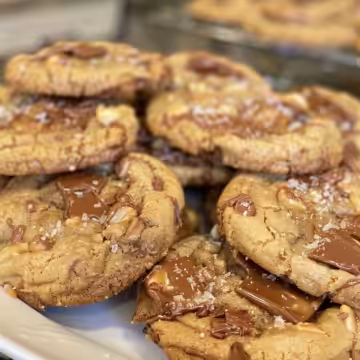 Peanut Butter Chocolate Caramel Cookies taken with iphone 15 pro max --iw 2 --ar 4:5 --v 6.0 --raw