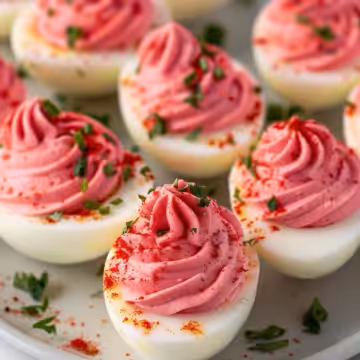 Perfectly Pink Deviled Eggs taken with iphone 15 pro max --iw 2 --ar 4:5 --v 6.0 --raw
