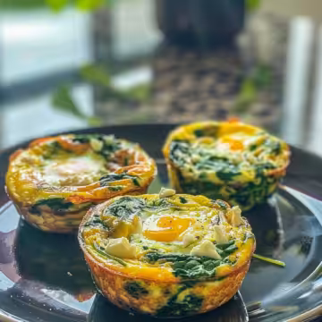 Quick & Healthy Egg Muffins with Spinach and Feta taken with iphone 15 pro max --iw 2 --ar 4:5 --v 6.0 --raw