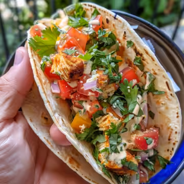 Quick Mediterranean Chicken Tacos taken with iphone 15 pro max --iw 2 --ar 4:5 --v 6.0 --raw