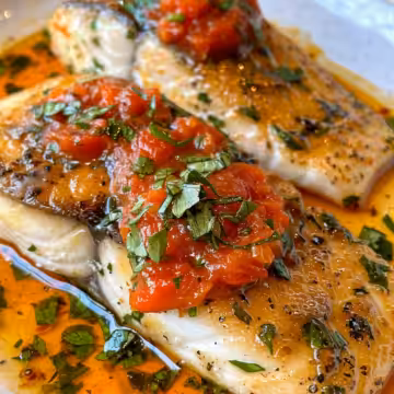 Quick Mediterranean Tilapia with Roasted Pepper Sauce taken with iphone 15 pro max --iw 2 --ar 4:5 --v 6.0 --raw