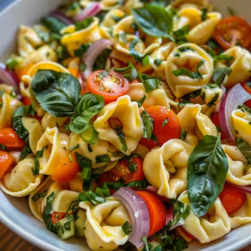 Simple Cold Tortellini Pasta Salad taken with iphone 15 pro max --iw 2 --ar 4:5 --v 6.0 --raw