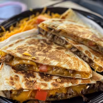 Smashburger Quesadillas taken with iphone 15 pro max --iw 2 --ar 4:5 --v 6.0 --raw