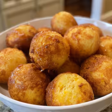 Southern-Style Honey Butter Cornbread Poppers taken with iphone 15 pro max --iw 2 --ar 4:5 --v 6.0 --raw