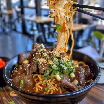 Sticky Beef Noodles taken with iphone 15 pro max --iw 2 --ar 4:5 --v 6.0 --raw