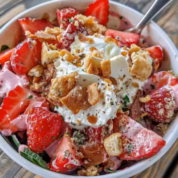 Strawberry Crunch Salad taken with iphone 15 pro max --iw 2 --ar 4:5 --v 6.0 --raw