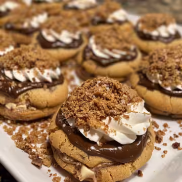 Stuffed Biscoff Butter Lava Cookies taken with iphone 15 pro max --iw 2 --ar 4:5 --v 6.0 --raw