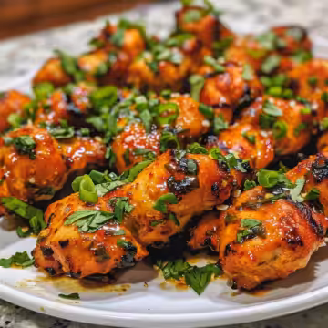 Sweet and Savory Honey Butter Chicken taken with iphone 15 pro max --iw 2 --ar 4:5 --v 6.0 --raw
