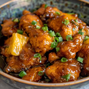 Sweet & Sticky Pineapple Bourbon Chicken taken with iphone 15 pro max --iw 2 --ar 4:5 --v 6.0 --raw