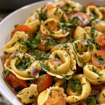 Tortellini Pasta Salad taken with iphone 15 pro max --iw 2 --ar 4:5 --v 6.0 --raw