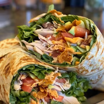 Turkey Ranch Club Wrap taken with iphone 15 pro max --iw 2 --ar 4:5 --v 6.0 --raw