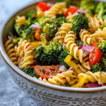 Ultimate Easy Broccoli Pasta Salad taken with iphone 15 pro max --iw 2 --ar 4:5 --v 6.0 --raw